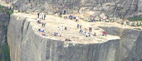 people enjoying the views from Pulpit Rock - seen from a sightseeing helicopter