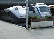 a fast train and local train at Stavanger station